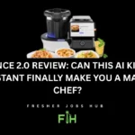 Close-up of the Upliance 2.0 kitchen assistant, showing its digital screen and stainless steel cooking jar on a countertop.